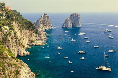 Faraglioni Rocks Capri Island In Sunset Stock Photo Image Of Boats