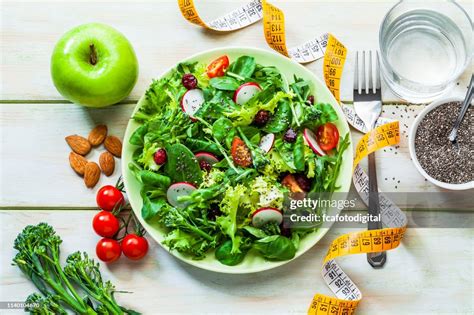 Healthy Eating And Dieting Concepts Fresh Healthy Salad Fruits And Tape