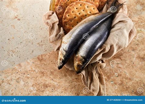 Catholic Still Life Of Five Loaves Of Bread And Two Fish Stock Image