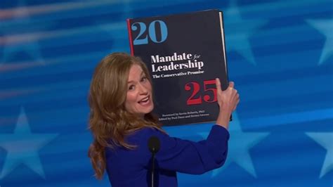 Michigan state senator brings out giant copy of Project 2025 at the DNC