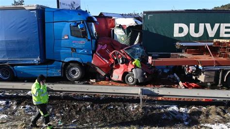 A Truck That Has Been Overturned On The Side Of The Road