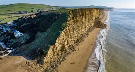 West Bay Watch As Enormous Chunk Of Cliff Collapses Into Sea