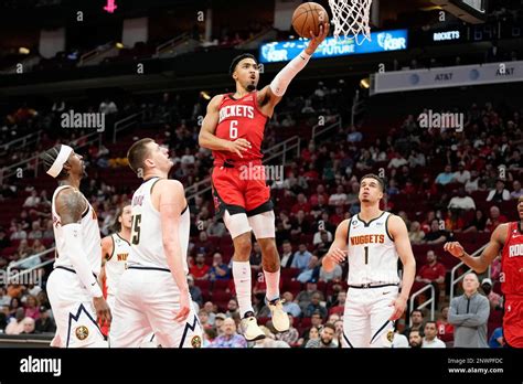 Houston Rockets Forward Kenyon Martin Jr 6 Shoots Past Denver Nuggets Center Nikola Jokic