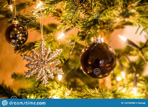 Christmas Background Of De Focused Lights Decorated Tree Illuminated