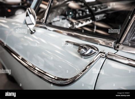 Vintage blue car with chrome detail in a salon Stock Photo - Alamy