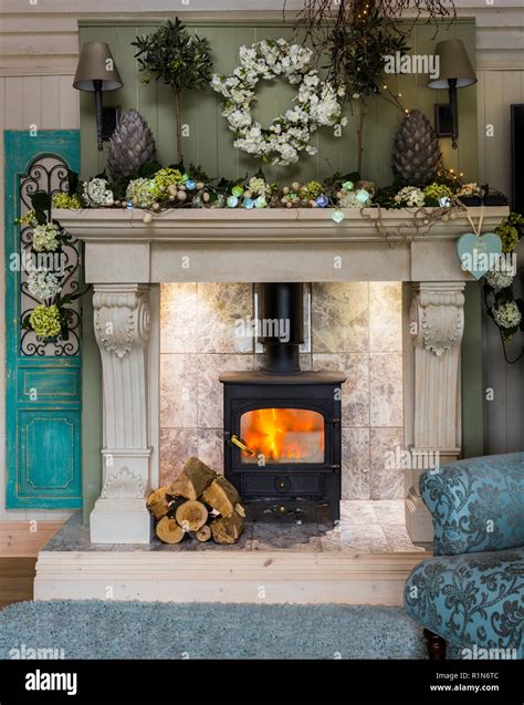 Modern Rustic fireplace and surround Stock Photo - Alamy