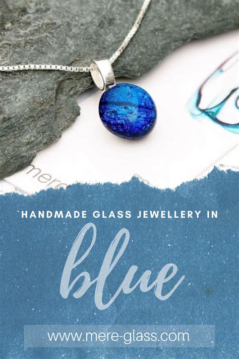 Blue Dichroic Glass Pendant Necklace With A Sterling Silver Chain