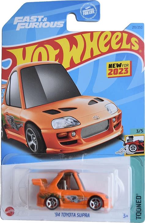 Hot Wheels 94 Toyota Supra Tooned 3 5 Orange 211 250 Amazon Ca