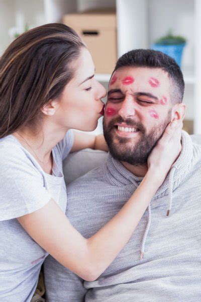 Woman Kissing Man With Red Lipstick Stock Photo By Nikodash