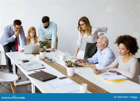 Joyful Multiracial Business Team At Work In Modern Office Stock Image