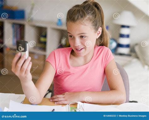 Young Girl Distracted From Her Homework Stock Photography Image 6440232