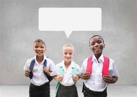 Students With Speech Bubble Against Grey Background Stock Image Image