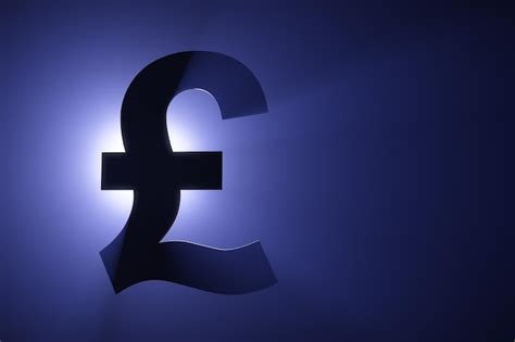 Premium Photo | British pound sterling symbol with spotlight