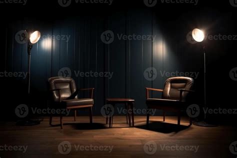 Two Chairs And Spotlights In Podcast Or Interview Room On Dark