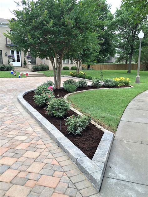 Create Curb Appeal with a Stunning Flower Bed at the End of Your Driveway