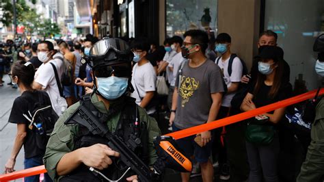 Hong Kong Police Arrest At Least 60 After Pro Democracy Protest On Chinese Holiday Cbc News