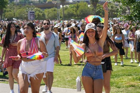 Parade Of Lesbians And Gays Rainbow Flags At Gay Pride Parade