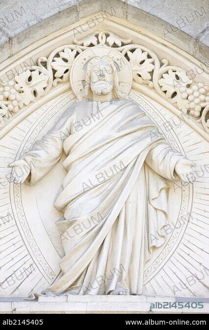 Christ sculpture on church tympanum. - Album alb2145405