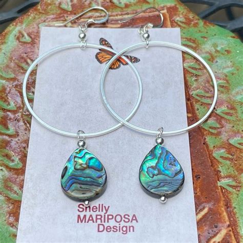 These Large Silver Hoop Earrings With Abalone Shell Teardrops Are