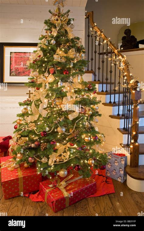 Christmas tree, presents, and decorations in an American home Stock Photo: 24059386 - Alamy