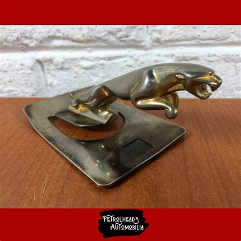 Vintage Jaguar Hood Ornament on Stand - AuctionGiant