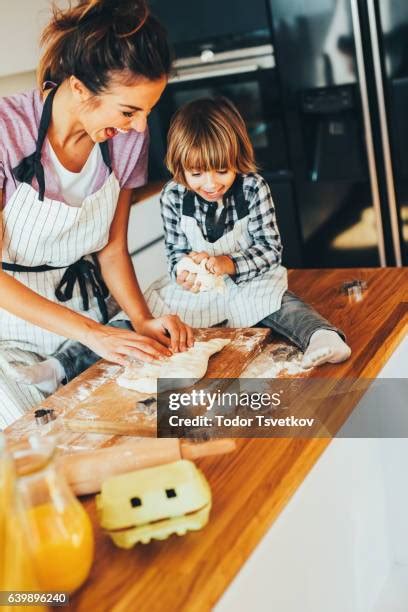 Kids Making Mess In Kitchen Photos And Premium High Res Pictures