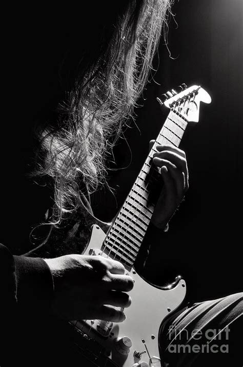 Long Hair Man Playing Guitar Photograph By Arletta Cwalina