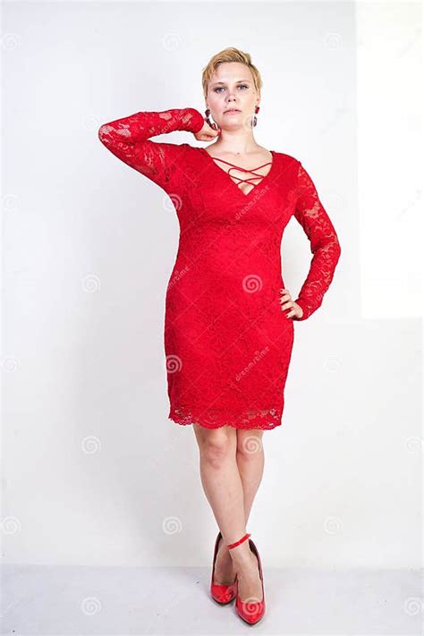 Fashion Female In Red Lace Dress Standing Alone Plus Size Blonde Woman