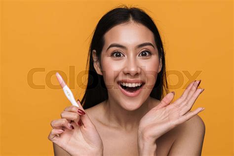 Beauty Portrait Of Young Half Naked Woman Holding Pregnancy Test Stock Image Colourbox