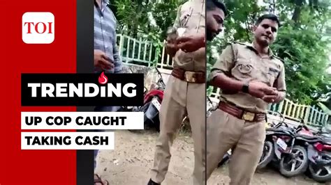 Watch Up Policeman Caught On Cam Taking Bribe From Drug Peddler