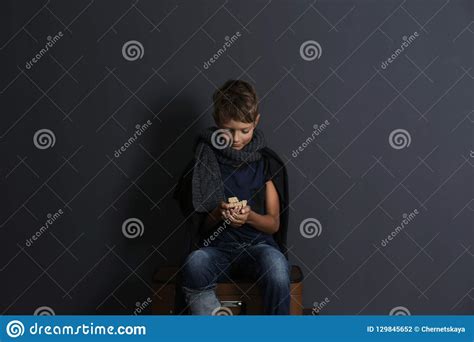 Poor Boy with Pieces of Bread Stock Photo - Image of failure, beggar ...