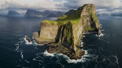 View Of Cliffs Above The Ocean And Kallur Lighthouse Kalsoy Island