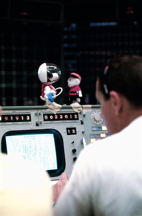 Replicas Of Snoopy And Charlie Brown Decorate Top Of Console In Mcc