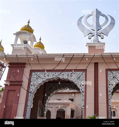 Khanda Sikh Holy Religious Symbol At Gurudwara Entrance With Bright