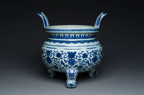 A Large Chinese Blue And White Bajixiang Tripod Censer With Lotus