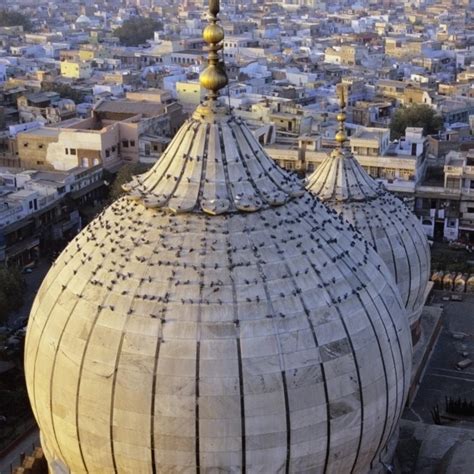 India Delhi Jama Masjid Aerial View Of Mosque With Birds Sitting Atop City Skyline In Distance ...