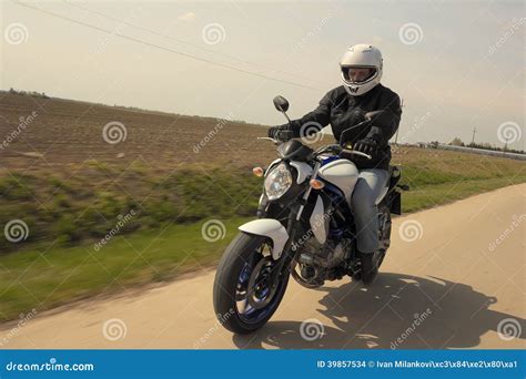 Man driving motorcycle stock photo. Image of dunlop, tyre - 39857534