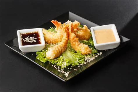 Tempura Deep Fried Shrimp Ebi With Sweet Chili And Soy Sauce On Black