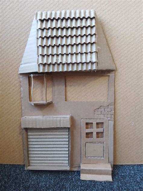 Pin by Clarence Stahlman on cardboard art | Cardboard house, Cardboard ...