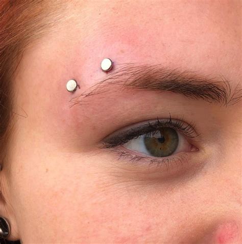 Fresh Horizontal Brow Surface Piercing With 4mm Titanium Tops And A