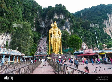 The Batu Caves and the colossal statue of Lord Murugan. Photo taken ...