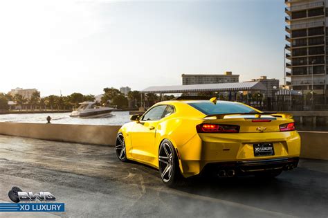 Yellow Camaro SS with Black Stripe on XO Luxury Wheels | CARiD.com Gallery