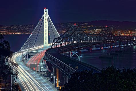 The New And Old Bay Bridge At Night Bay Bridge Old Bay Golden Bridge