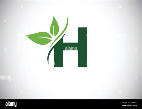 Initial H Monogram Alphabet With Two Leaves Green Eco Friendly Logo