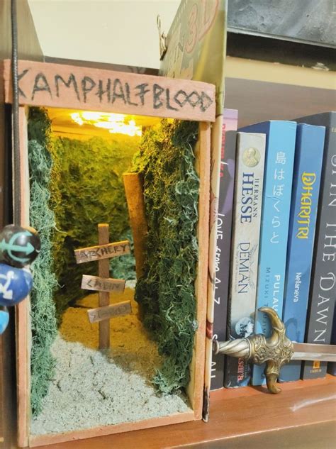 A Book Shelf Filled With Books And Miniature Figurines