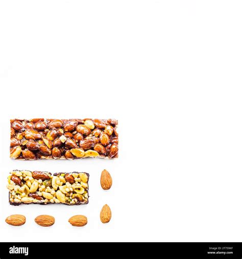 Dried fruits bar with space text white background Stock Photo - Alamy