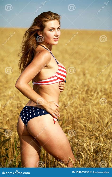 Woman In American Flag Bikini In A Wheat Field Stock Image Image Of