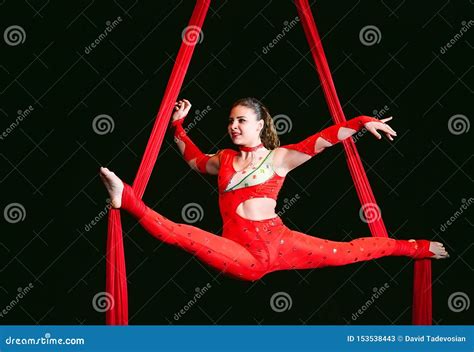 Acrobat Performs A Difficult Trick In The Circus Stock Image Image