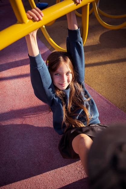 Free Photo Smiley Girl Having Fun At The Playground