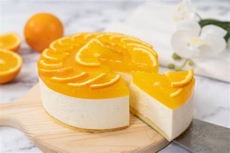 Premium Photo No Baked Orange Cheese Cake With Fresh Oranges Decoration